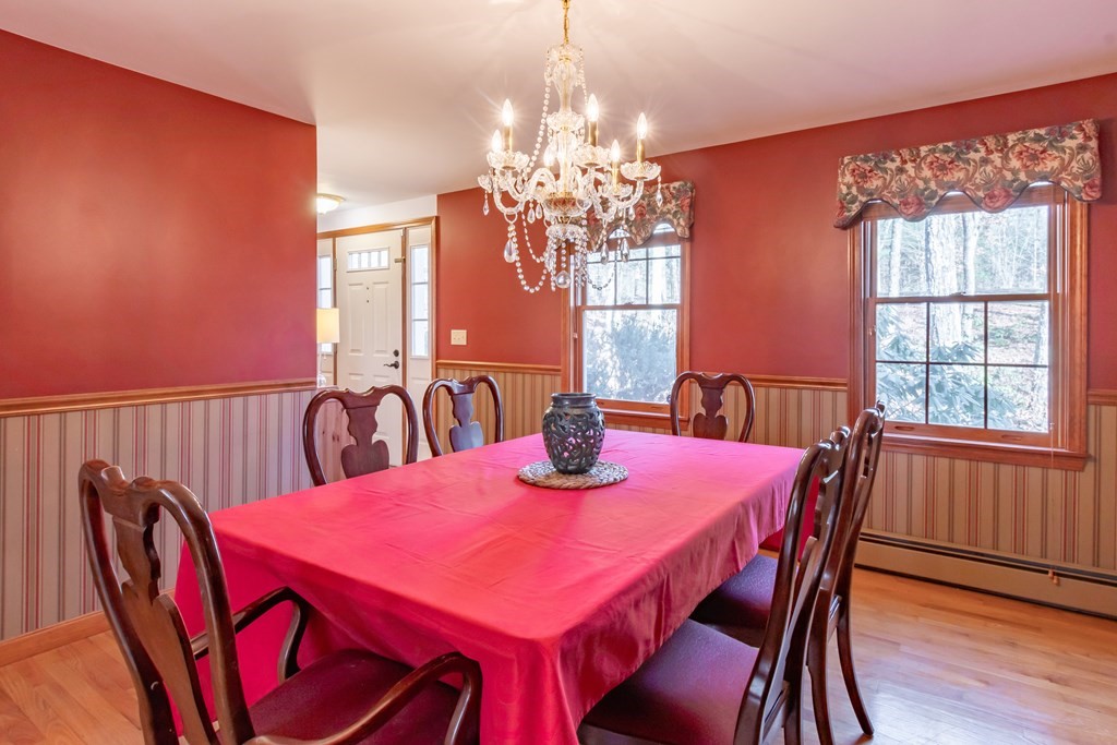 38 Westview Road Brookline, NH 03033 - Photo 3 of 28 a view of a dining room with furniture window and wooden floor