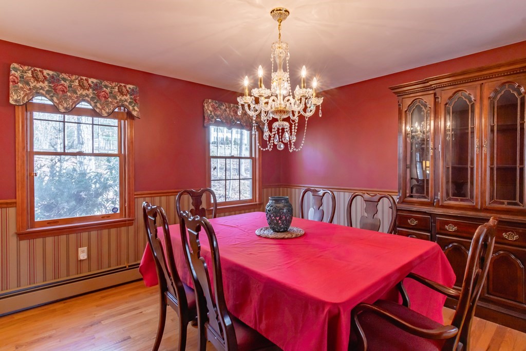 38 Westview Road Brookline, NH 03033 - Photo 4 of 28 a view of a dining room with furniture window and wooden floor