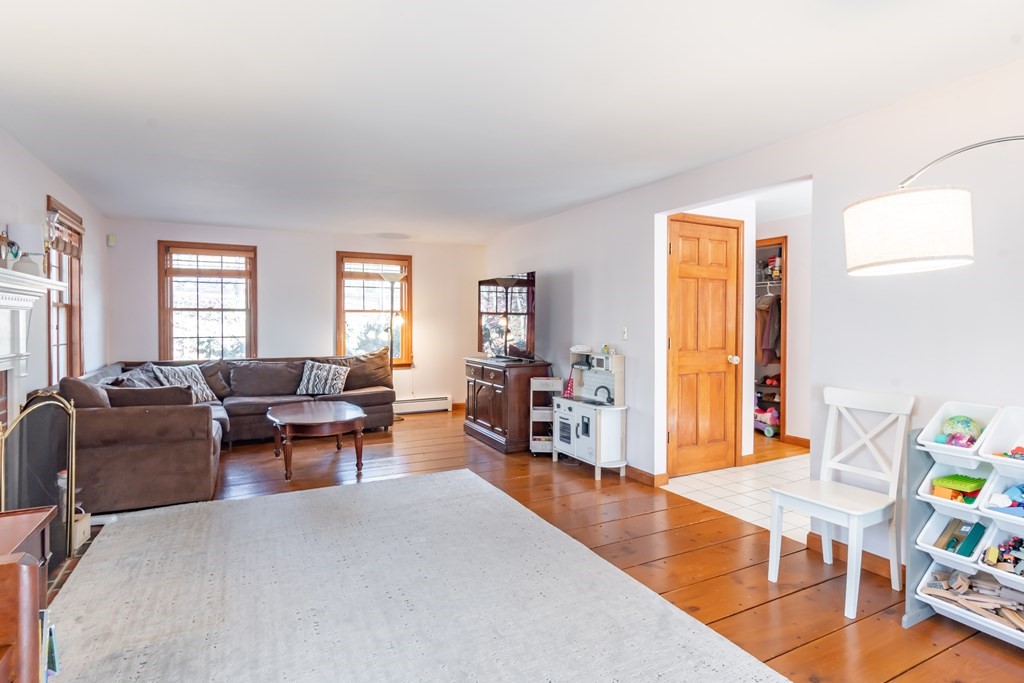 38 Westview Road Brookline, NH 03033 - Photo 6 of 28 a living room with furniture and wooden floor
