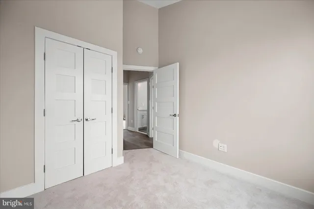 a view of a balcony with wooden floor