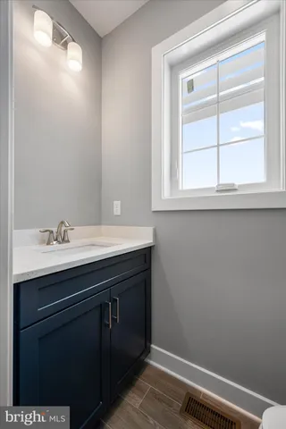 a view of a house with wooden deck