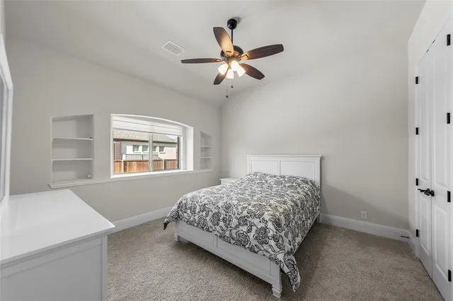 a bathroom with a double vanity sink mirror and