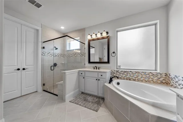 a view of a livingroom with wooden floor and stairs