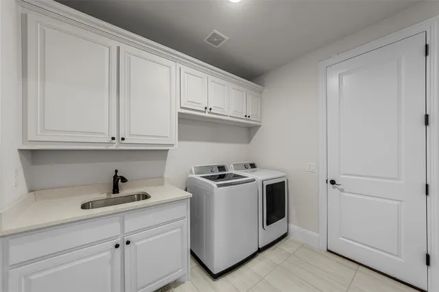 a view of staircase with wooden floor and white walls