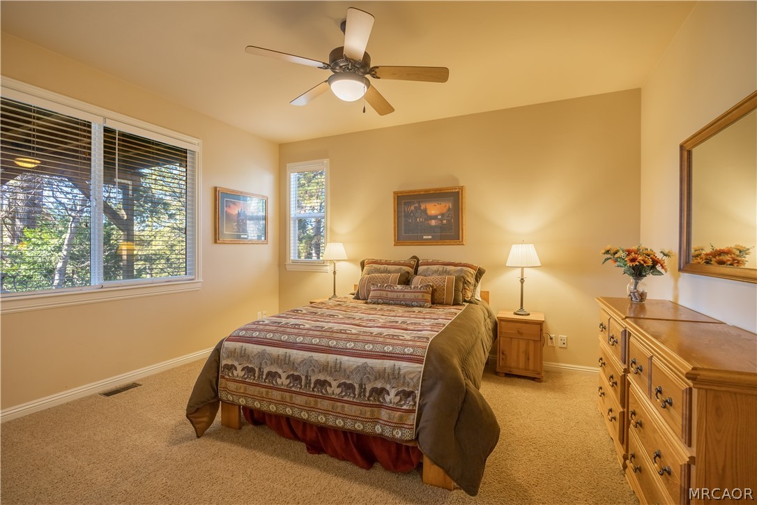 173 Grizzly Road Lake Arrowhead, CA 92352 - Photo 26 of 38 Lower level ensuite bedroom