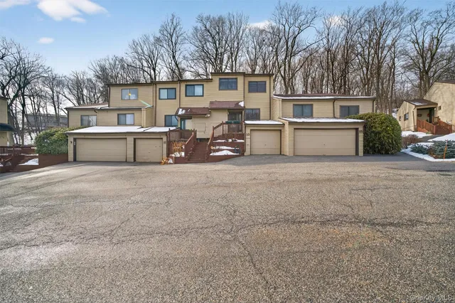 a view of a street with cars