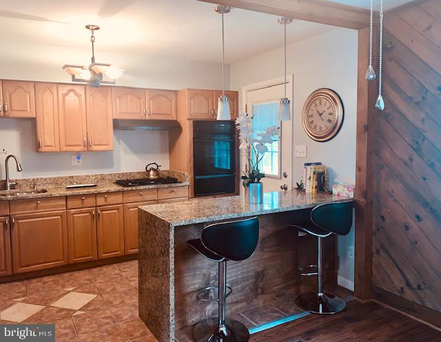 5678 Arnhem Road Baltimore, MD 21206 - Photo 9 of 39 Kitchen and island