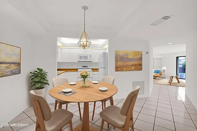 a view of a dining room with furniture