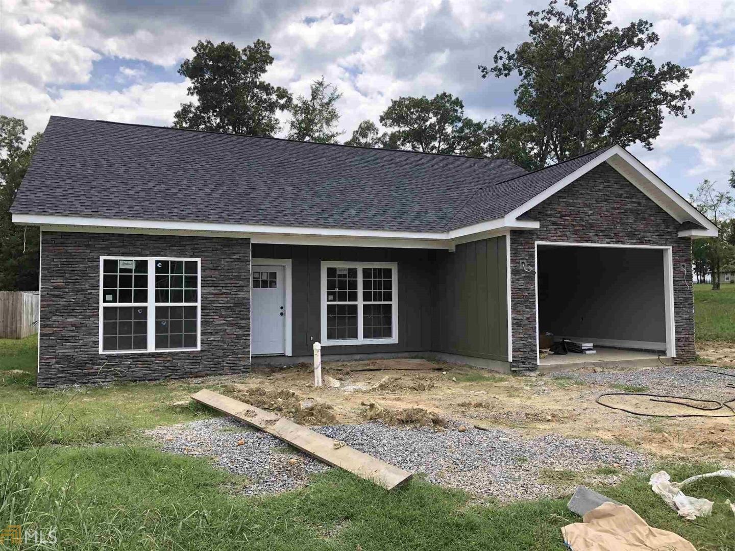 26 Pippin Place Northeast Rome, GA 30165 - Photo 1 of 1 a front view of a house with a yard