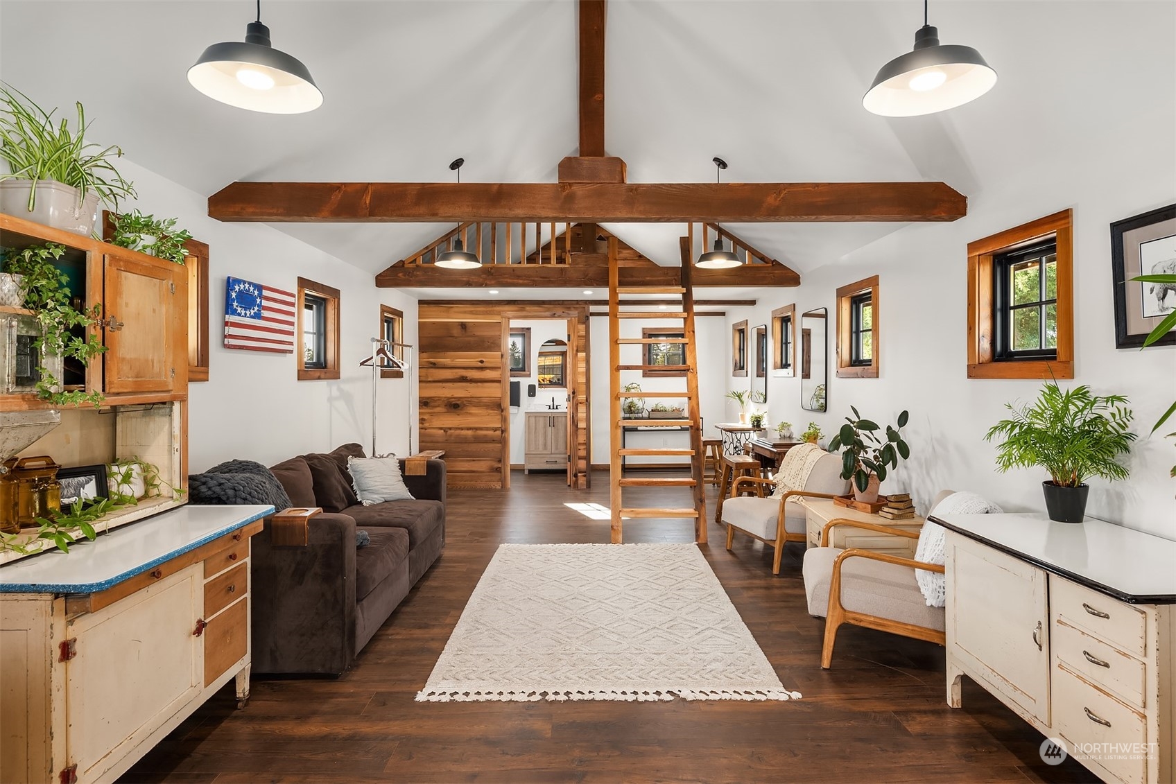 7715 Robe Menzel Road Granite Falls, WA 98252 - Photo 11 of 38 a living room with furniture kitchen view and large windows