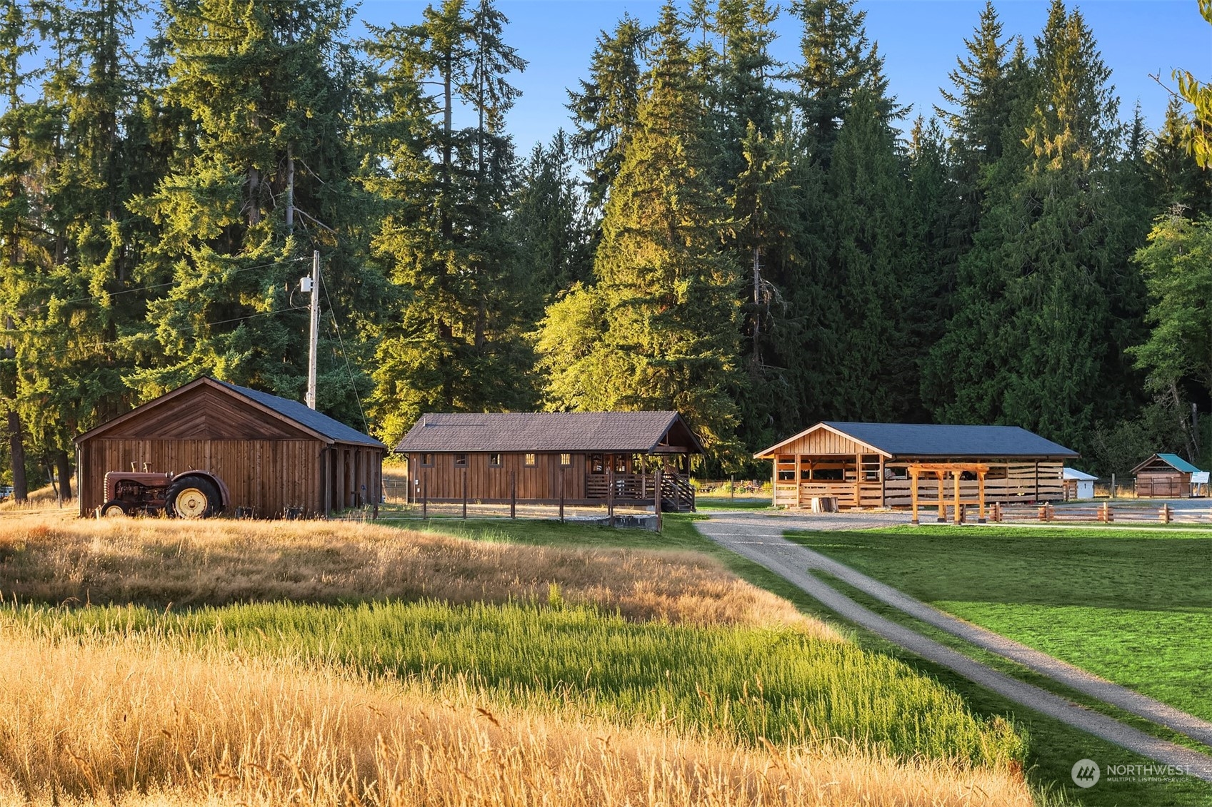 7715 Robe Menzel Road Granite Falls, WA 98252 - Photo 31 of 38 a view of house with garden space and swimming pool