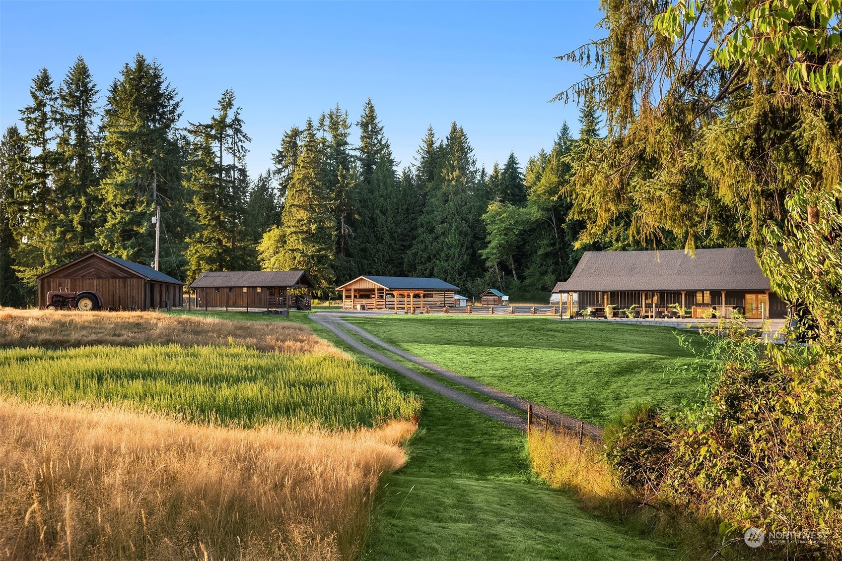 7715 Robe Menzel Road Granite Falls, WA 98252 - Photo 32 of 38 a view of a house with a yard and sitting area