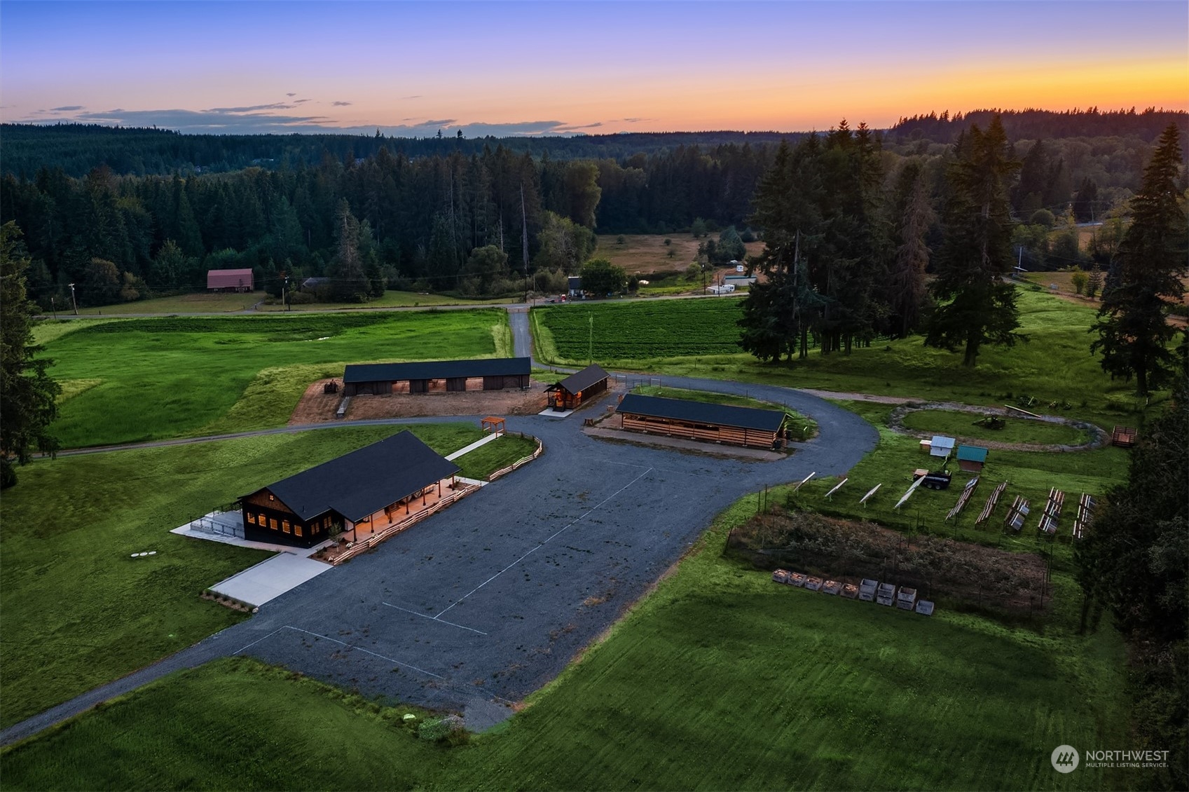7715 Robe Menzel Road Granite Falls, WA 98252 - Photo 38 of 38 a view of a park with large trees and a wooden fence