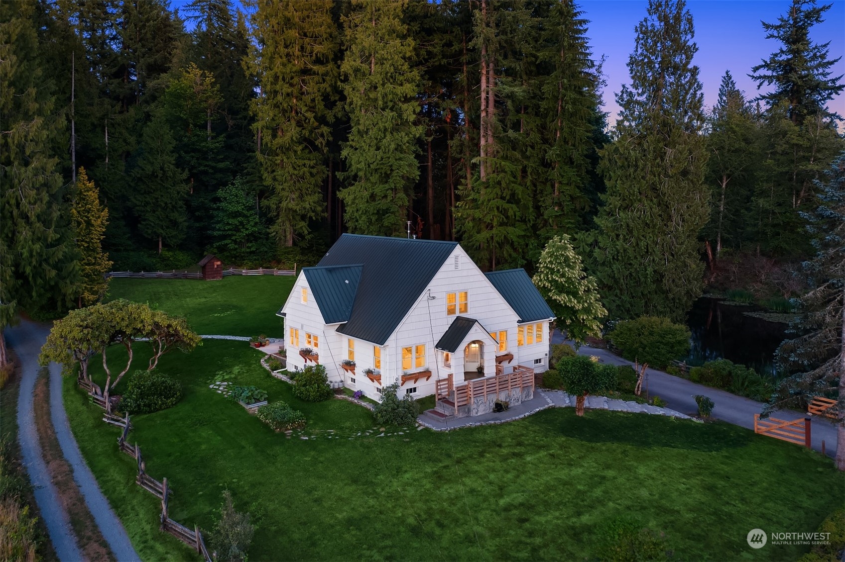 7715 Robe Menzel Road Granite Falls, WA 98252 - Photo 5 of 38 a aerial view of a house with garden