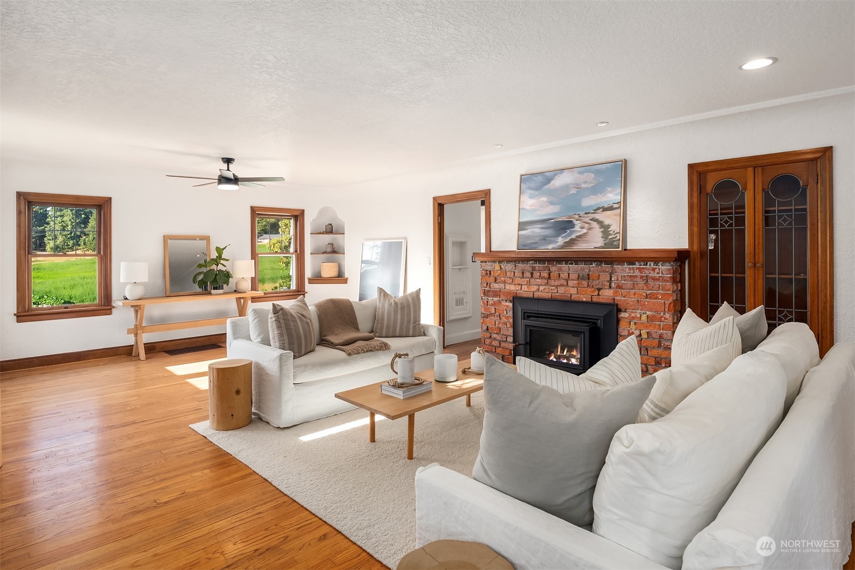 7715 Robe Menzel Road Granite Falls, WA 98252 - Photo 7 of 38 a living room with furniture and a fireplace
