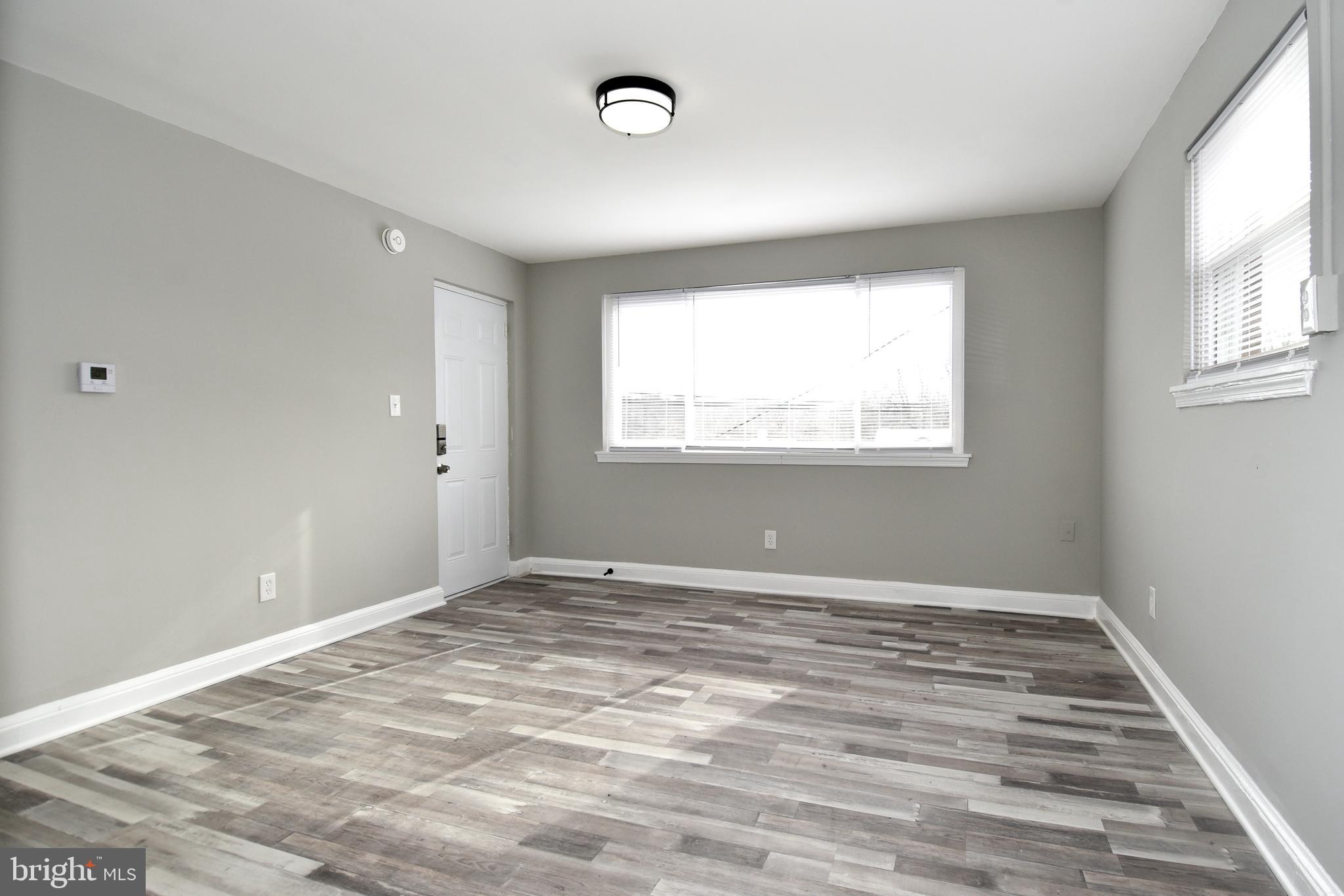 8208 Bellefonte Lane, Unit 2 Clinton, MD 20735 - Photo 13 of 38 a view of an empty room with a window