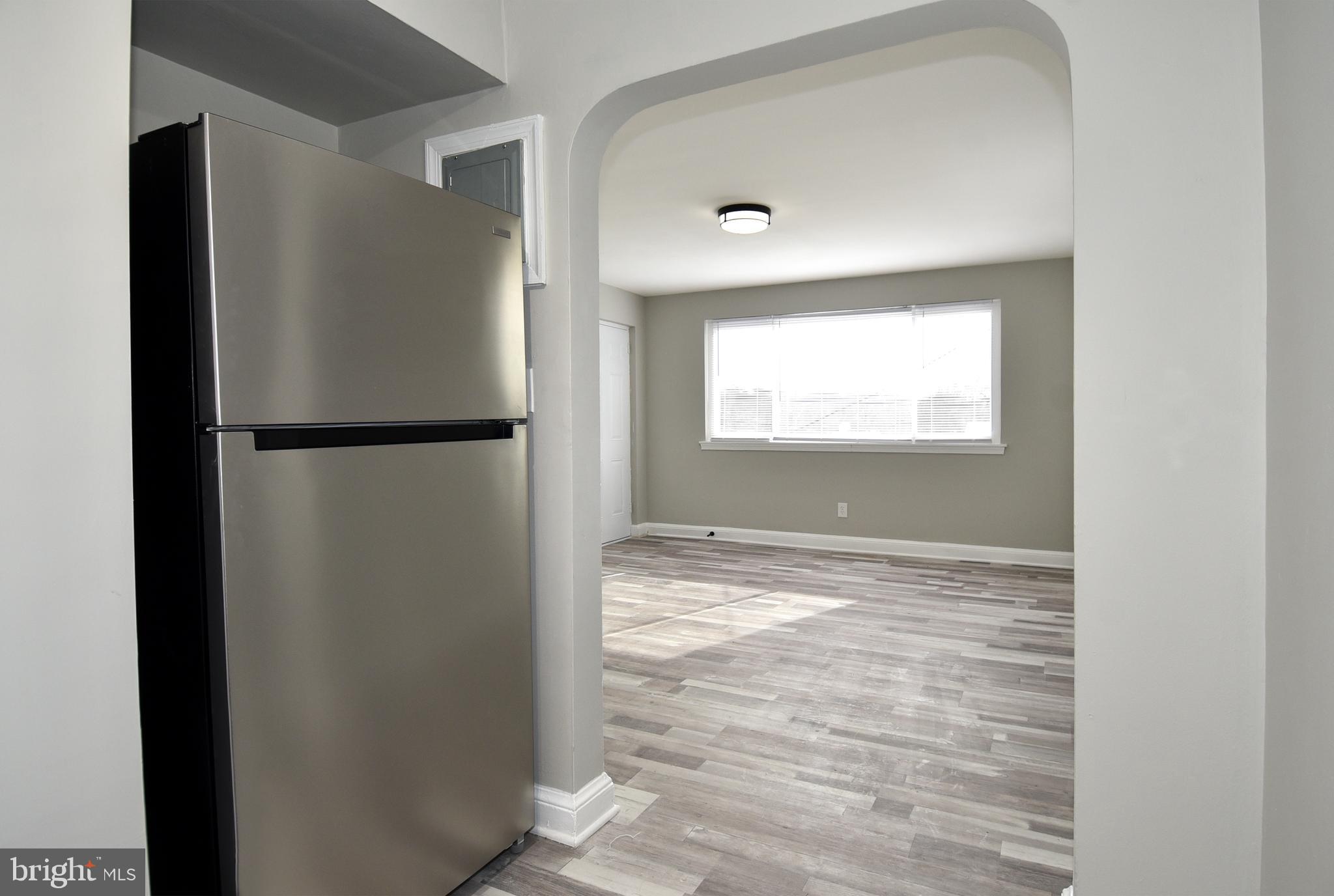 8208 Bellefonte Lane, Unit 2 Clinton, MD 20735 - Photo 19 of 38 a view of an empty room with a window