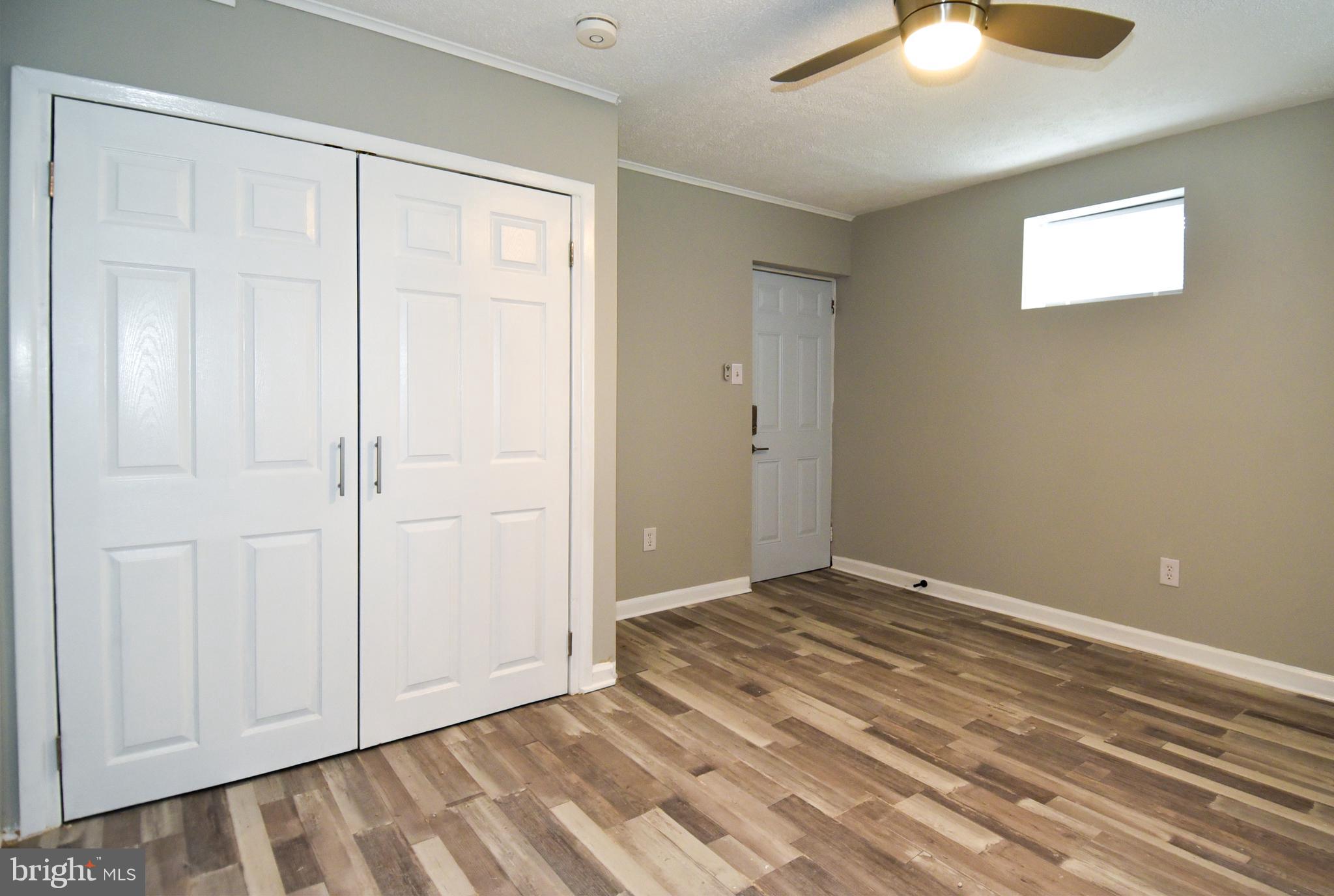 8208 Bellefonte Lane, Unit 2 Clinton, MD 20735 - Photo 28 of 38 wooden floor in an empty room