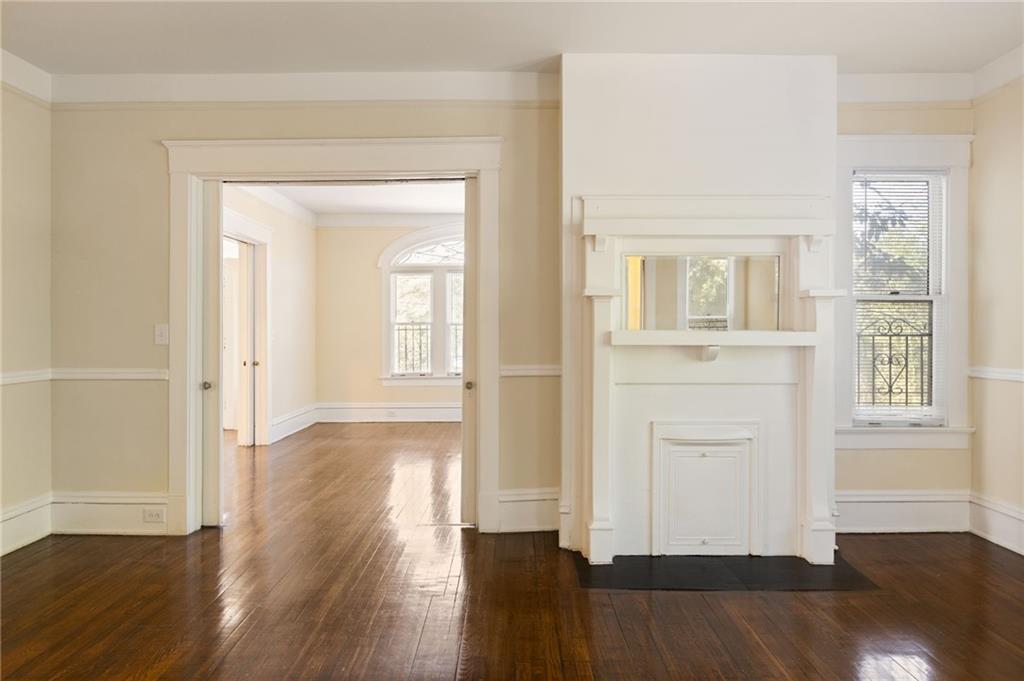 120 South Candler Street Decatur, GA 30030 - Photo 13 of 40 an empty room with wooden floor and windows