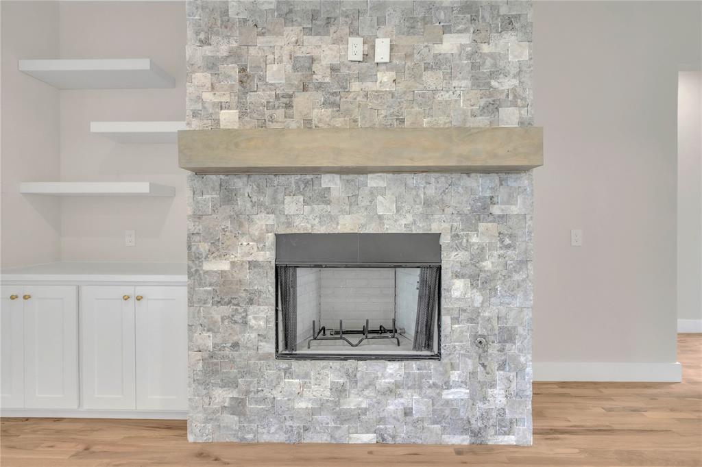 1028 Henry Way Springtown, TX 76082 - Photo 27 of 40 a room with a fireplace