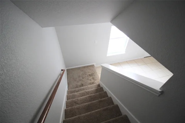 a view of street with parked cars