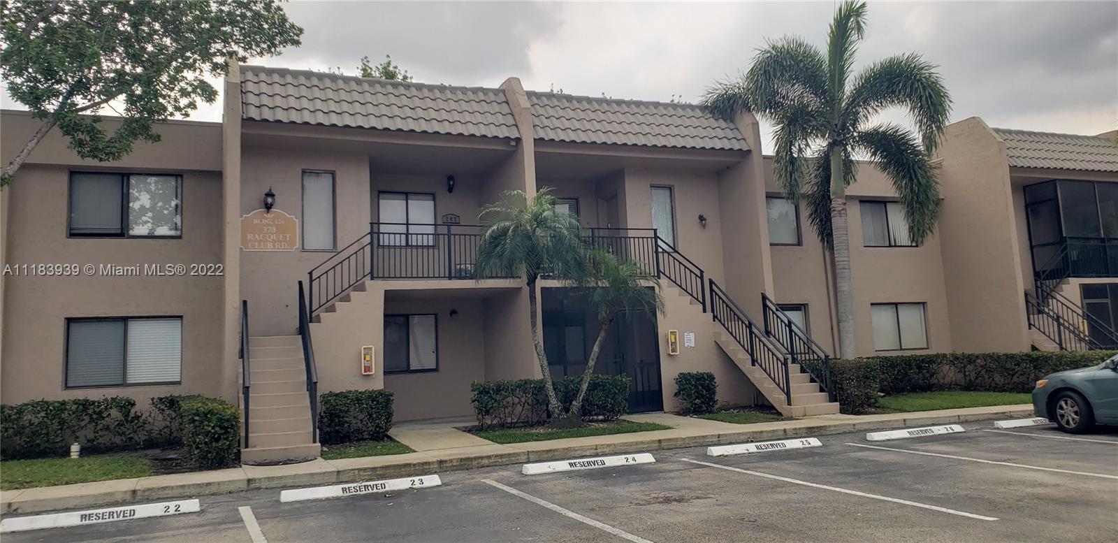 370 Racquet Club Road, Unit 103 Weston, FL 33326 - Photo 2 of 16 a view of a house
