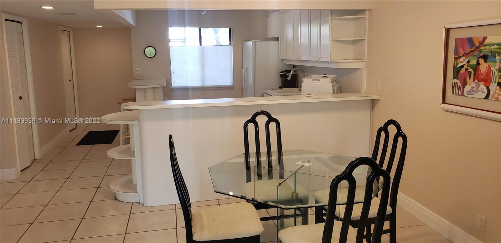 370 Racquet Club Road, Unit 103 Weston, FL 33326 - Photo 5 of 16 a view of kitchen with breakfast area