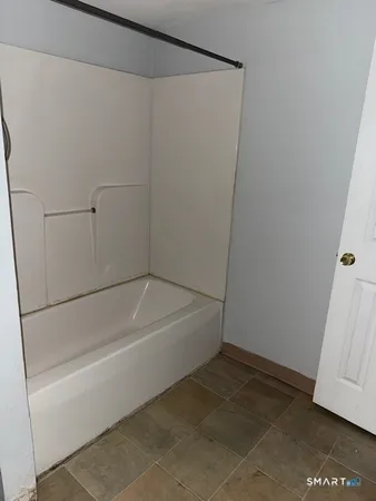 a bathroom with a bathtub