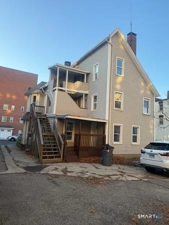 a front view of a house with a garage