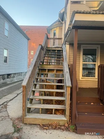 a view of entryway with a front door