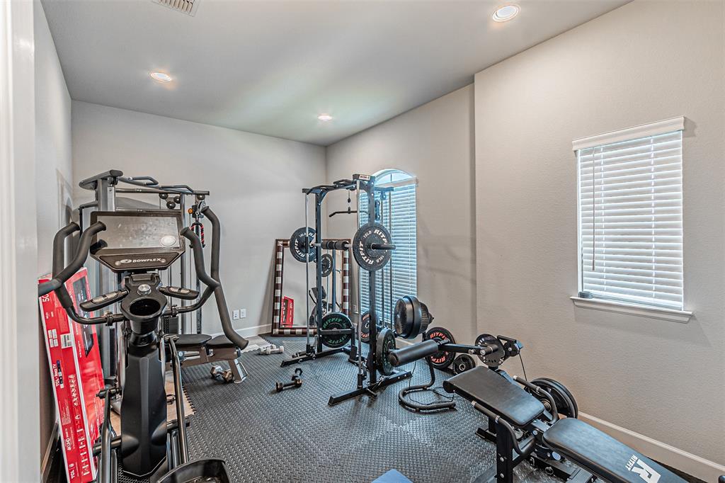 116 Derrett Lane Rhome, TX 76078 - Photo 15 of 30 a view of a room with gym equipment