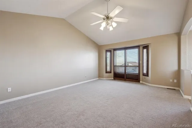 a spacious bathroom with a tub double vanity sink and a mirror