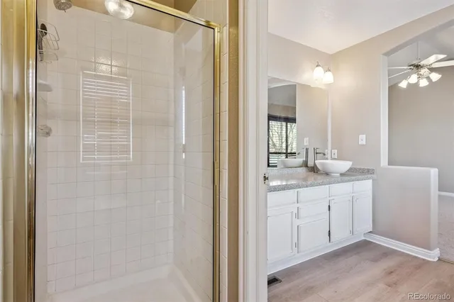 an empty room with closet and mirror