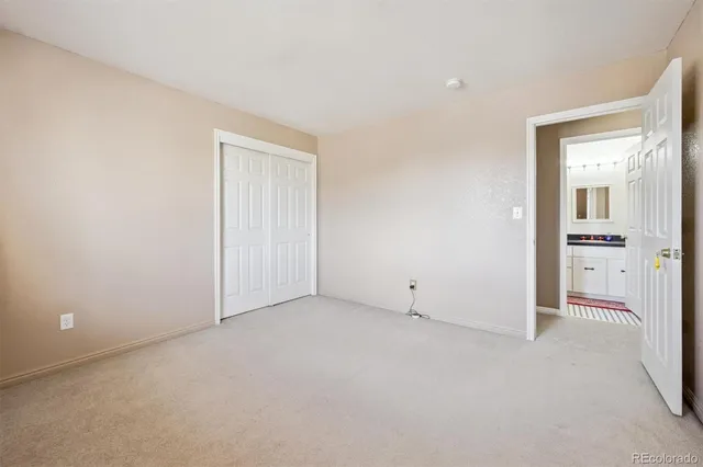 a bathroom with a bathtub and a window