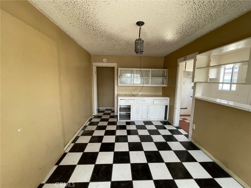 845 North Hagar Street San Fernando, CA 91340 - Photo 7 of 28 a black and white checkered floor