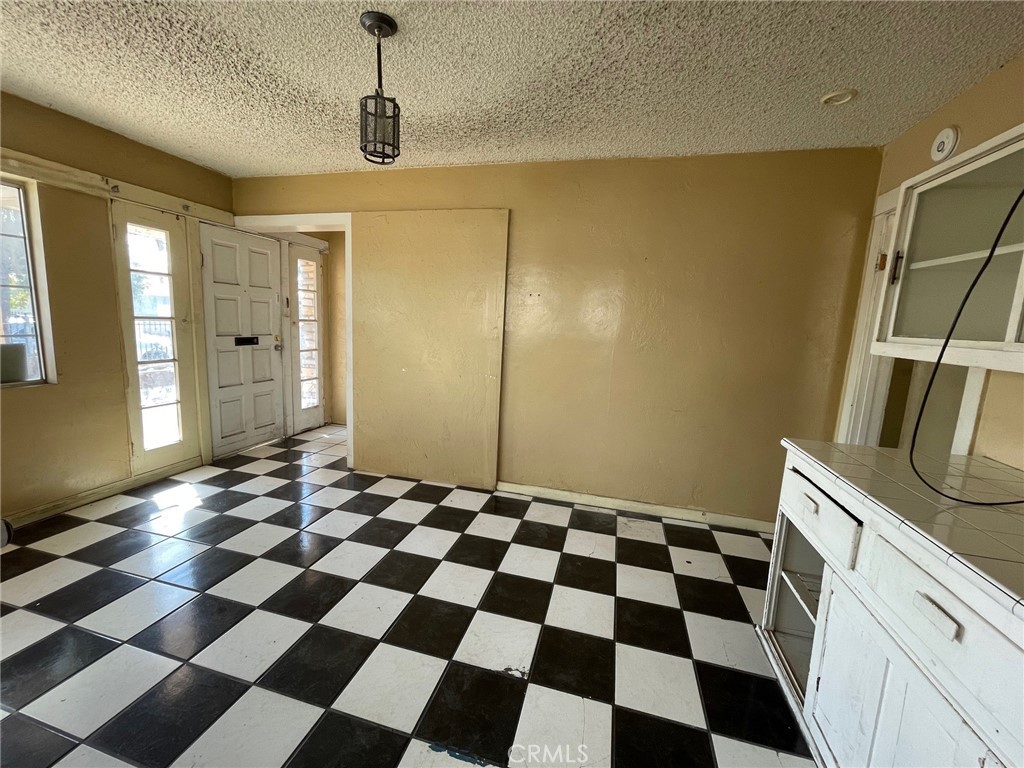 845 North Hagar Street San Fernando, CA 91340 - Photo 8 of 28 a black and white checkered floor