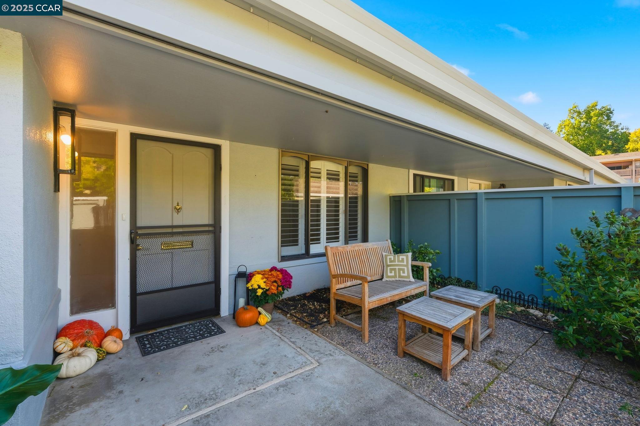 2425 Pine Knoll Drive, Unit 1 Walnut Creek, CA 94595 - Photo 2 of 43 a backyard of a house with outdoor seating