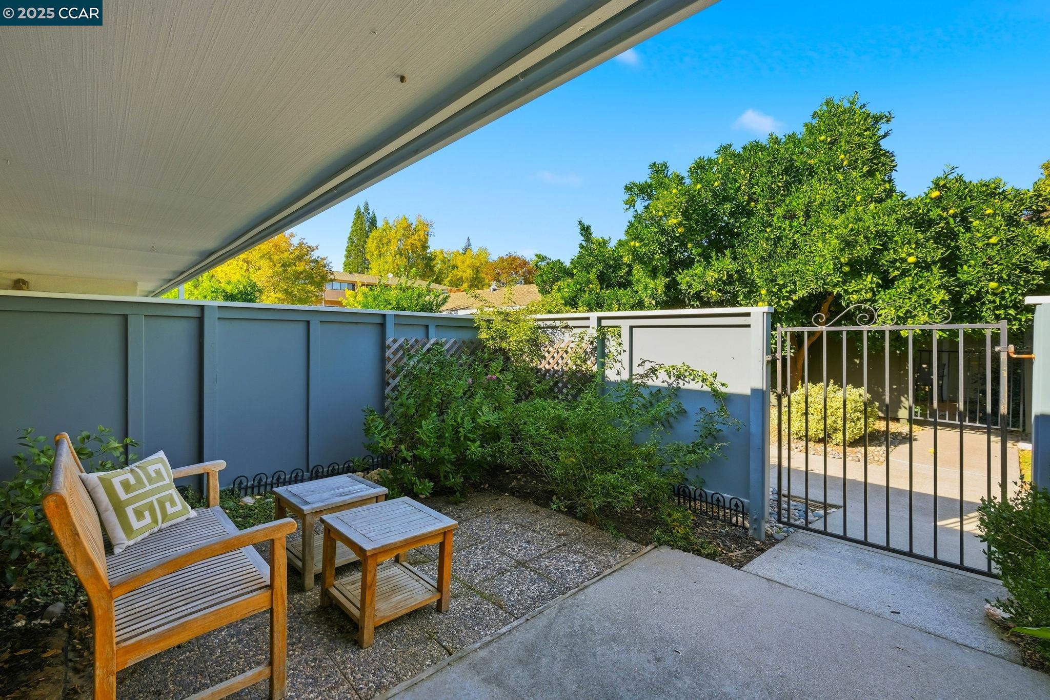 2425 Pine Knoll Drive, Unit 1 Walnut Creek, CA 94595 - Photo 28 of 43 a backyard view with a seating space