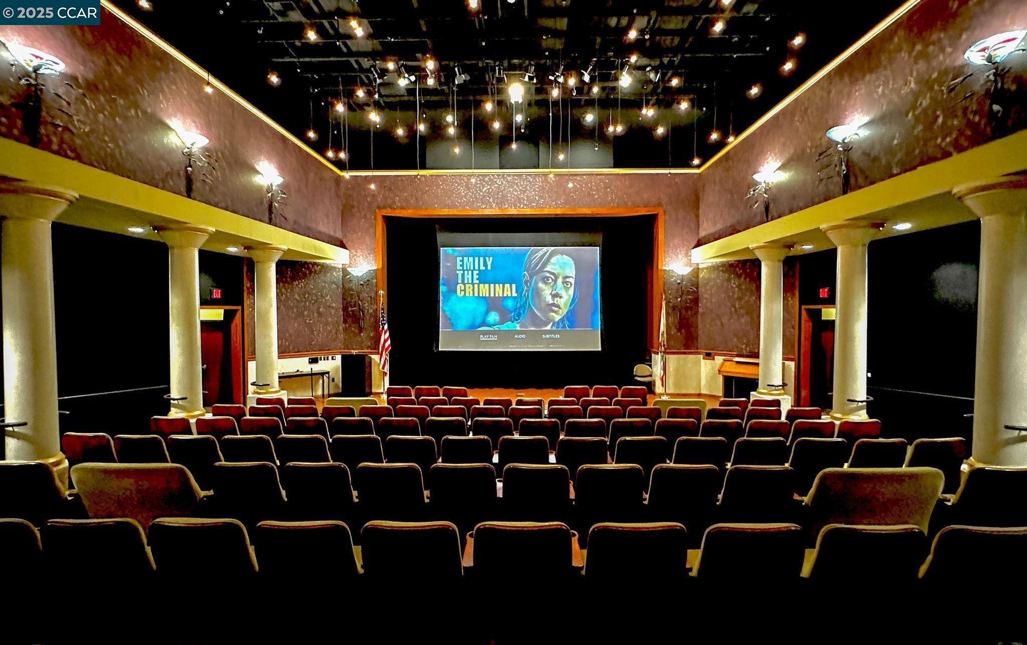 2425 Pine Knoll Drive, Unit 1 Walnut Creek, CA 94595 - Photo 41 of 43 a room with furniture projector and screen