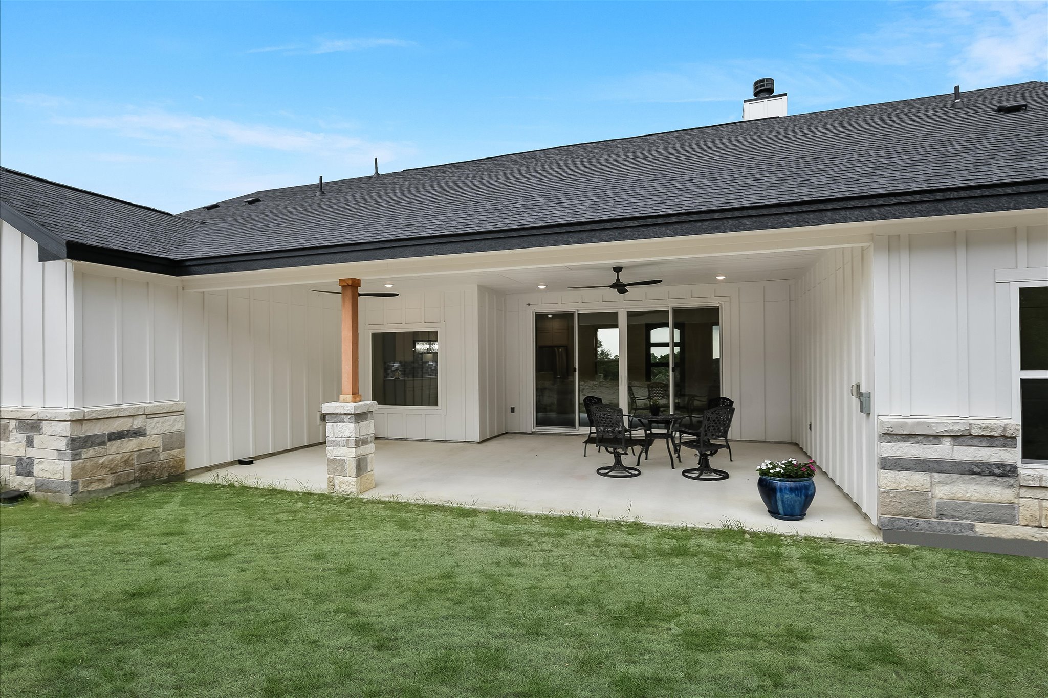 19920 Old Burnet Road Jonestown, TX 78645 - Photo 21 of 29 Covered back patio with ceiling fans in a very private setting on 5.41-Acres