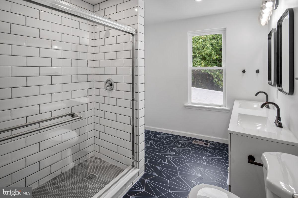 4129 Terrace Street Philadelphia, PA 19128 - Photo 15 of 27 a bathroom with a shower