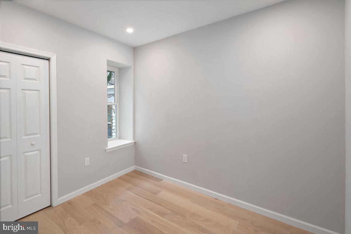 4129 Terrace Street Philadelphia, PA 19128 - Photo 20 of 27 an empty room with windows and closet
