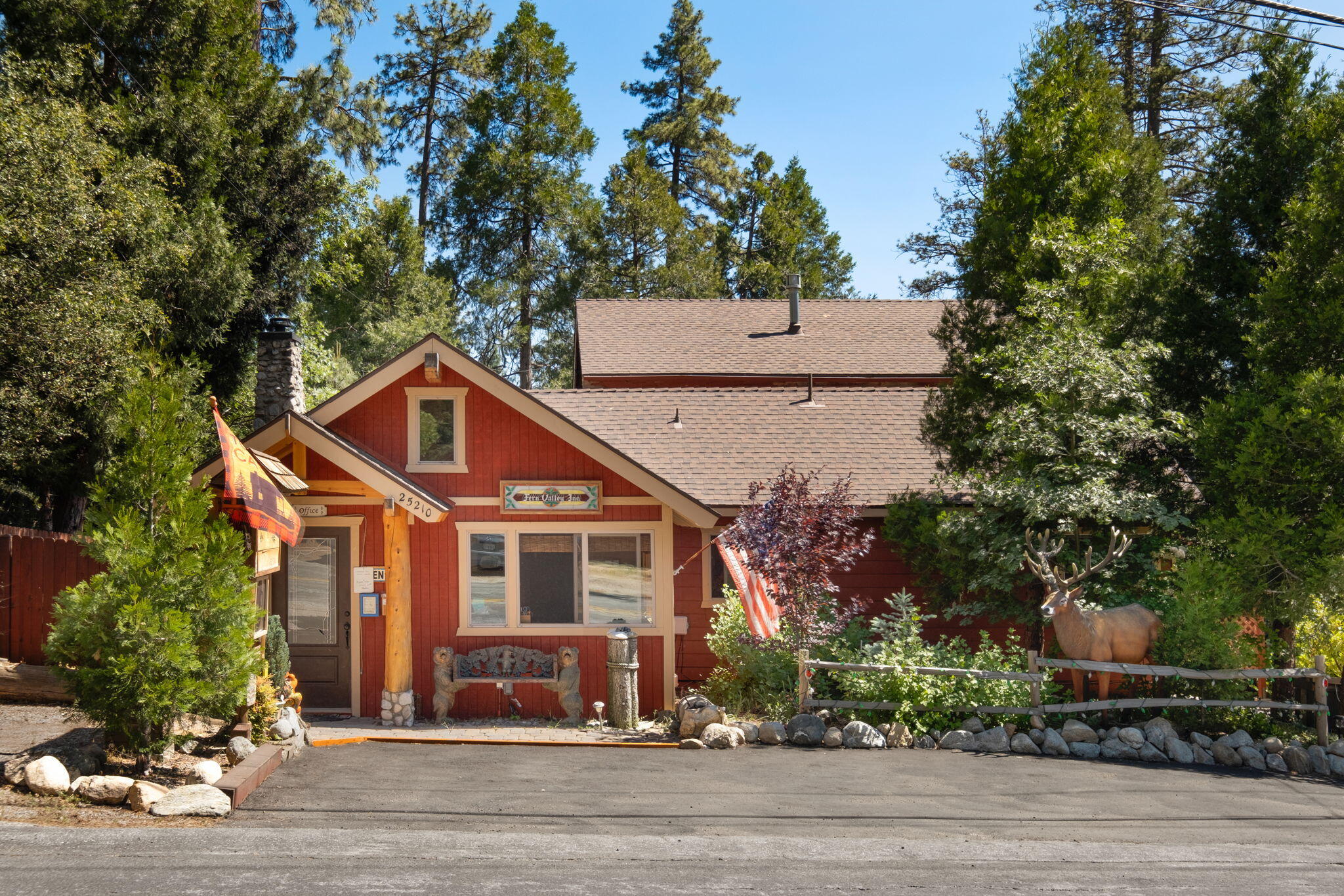 25210 Fern Valley Road Idyllwild, CA 92549 - Photo 16 of 127 a front view of a house with a yard and garage
