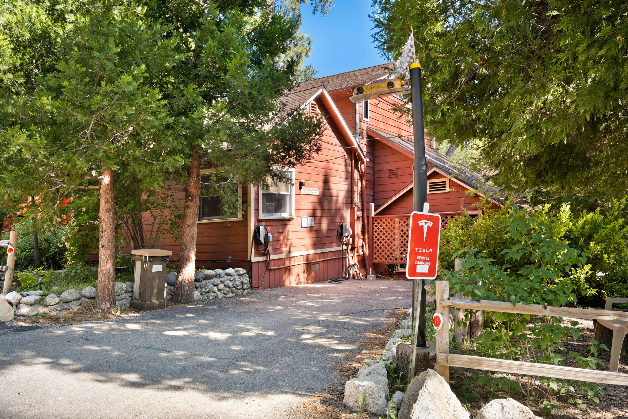 25210 Fern Valley Road Idyllwild, CA 92549 - Photo 18 of 127 a street sign on a sidewalk next to a road