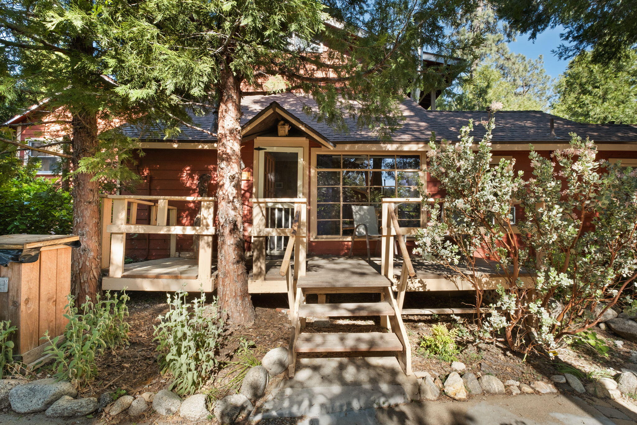 25210 Fern Valley Road Idyllwild, CA 92549 - Photo 31 of 127 a front view of a house with parking