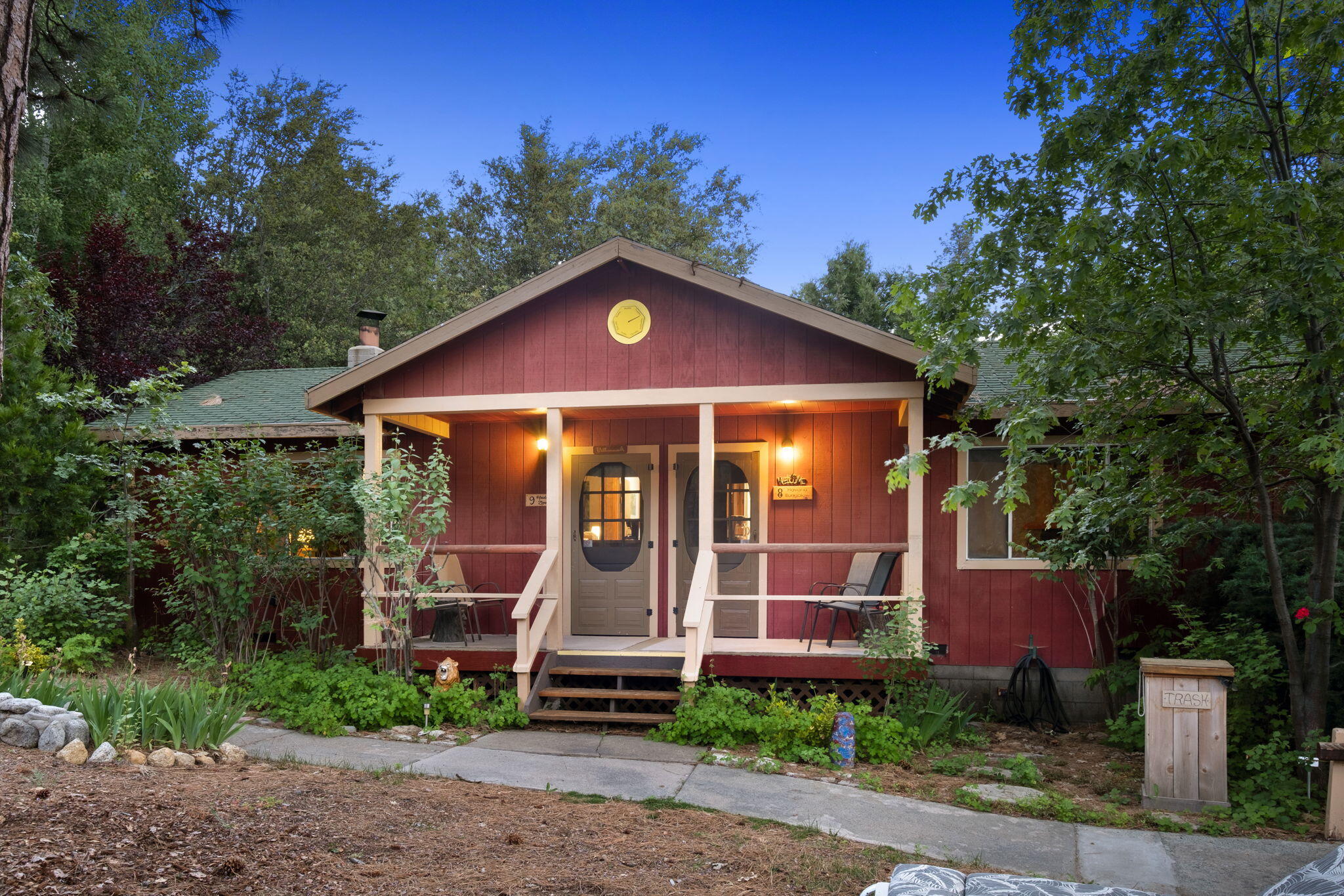 25210 Fern Valley Road Idyllwild, CA 92549 - Photo 4 of 127 a front view of a house with garden