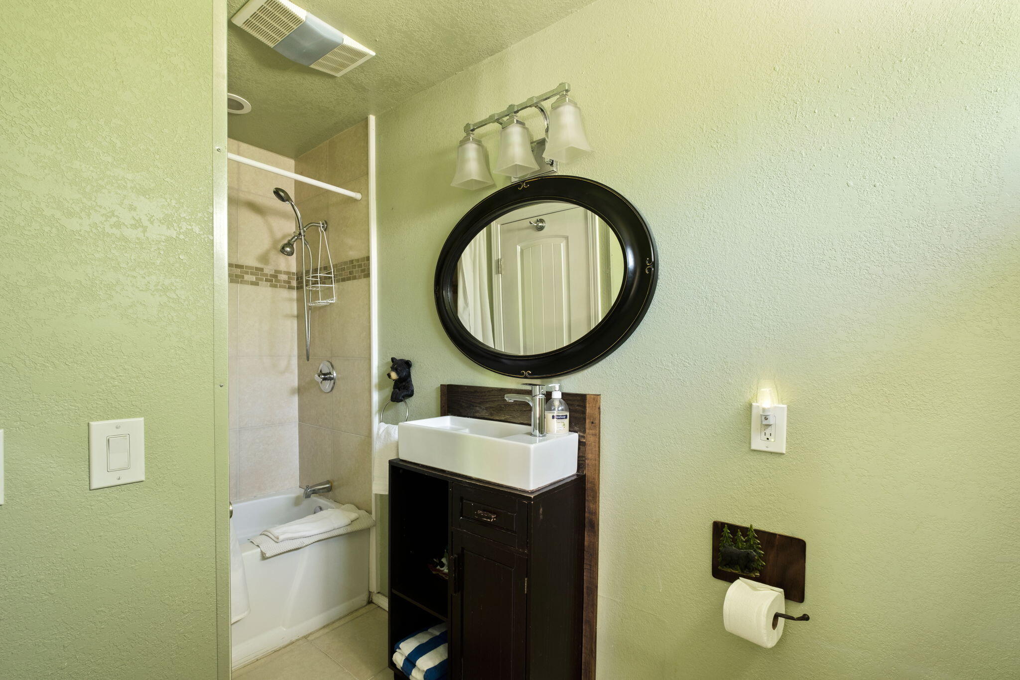 25210 Fern Valley Road Idyllwild, CA 92549 - Photo 44 of 127 a bathroom with a sink and a mirror