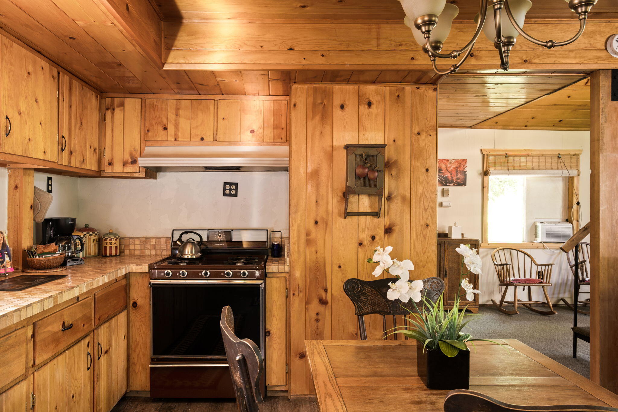 25210 Fern Valley Road Idyllwild, CA 92549 - Photo 50 of 127 a kitchen with stainless steel appliances granite countertop a stove a sink and a cabinets