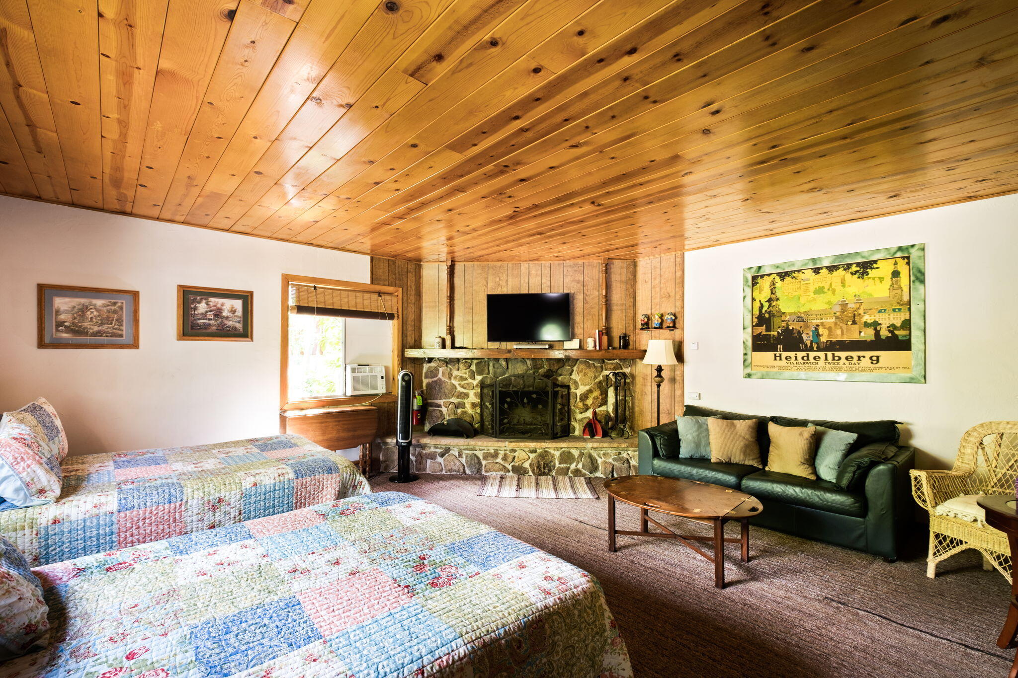25210 Fern Valley Road Idyllwild, CA 92549 - Photo 57 of 127 a bedroom with a bed a couch and dresser