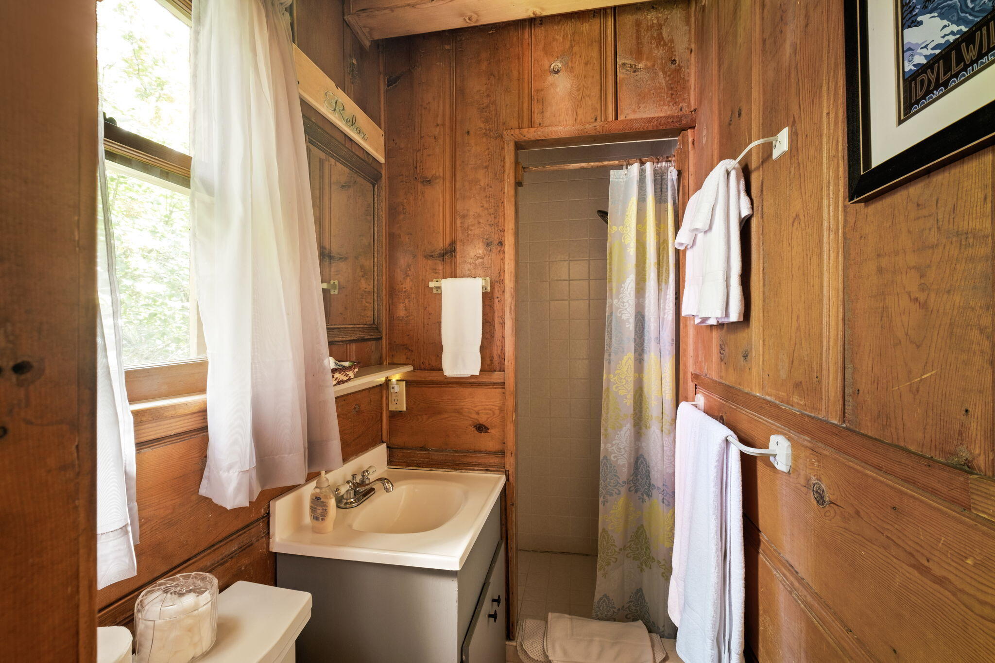 25210 Fern Valley Road Idyllwild, CA 92549 - Photo 69 of 127 a bathroom with a sink toilet and shower